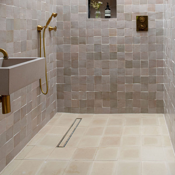 Beige cement tiles wet room floor