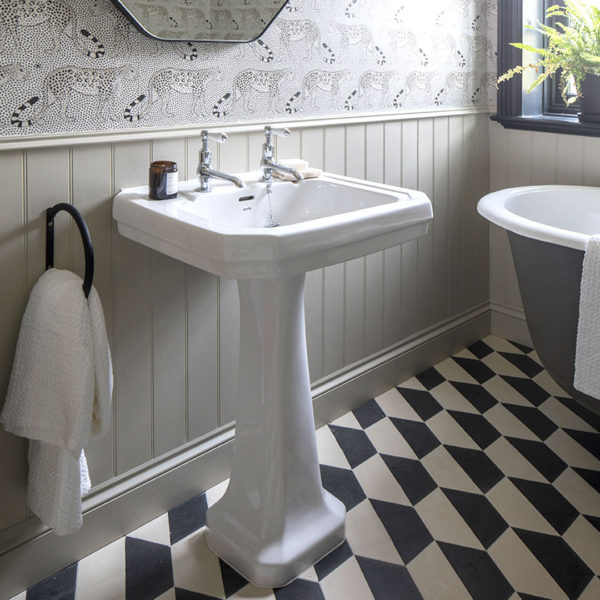 Hex monochrome patterned tiles on bathroom floor