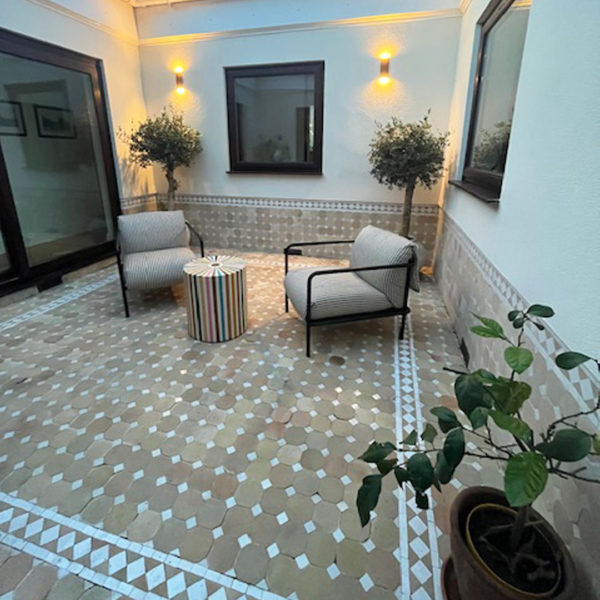 white octagon zellige tile floor outdoor courtyard