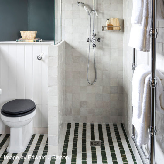 forest green stripe zellige bathroom floor